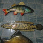 Змееголов (по центру)